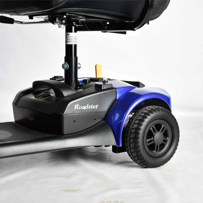 Close-up of the Merits Roadster 3 rear drive section with solid tire, battery housing, and durable wheel assembly.