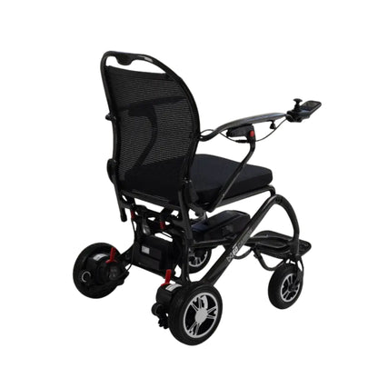 Rear three-quarter view of the Monarch MM60 Carbon folding power wheelchair with mesh backrest