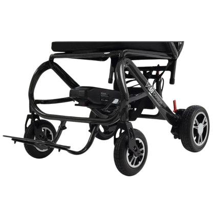 Underside view of the MM60 Carbon showing the folding frame, dual motors, and battery