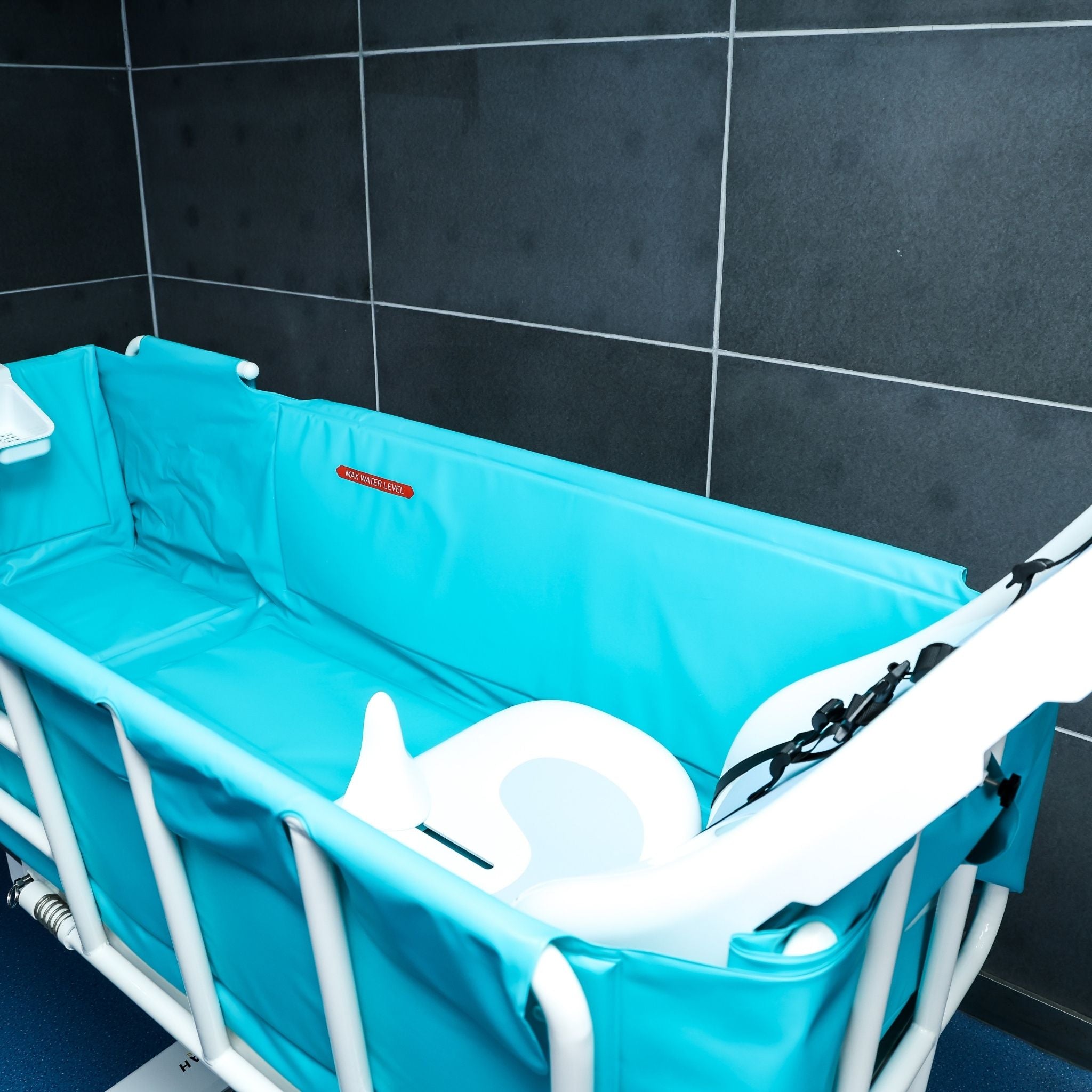 Rear view of Morgan AH Medical bathing trolley showing bathing surface and support system