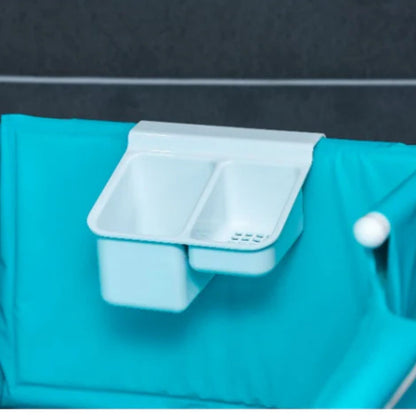 Integrated storage caddy for bathing supplies on Morgan AH Medical bathing trolley