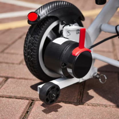 Close-up of the OAS Air Pro rear hub motor with freewheel clutch and anti-tip wheel
