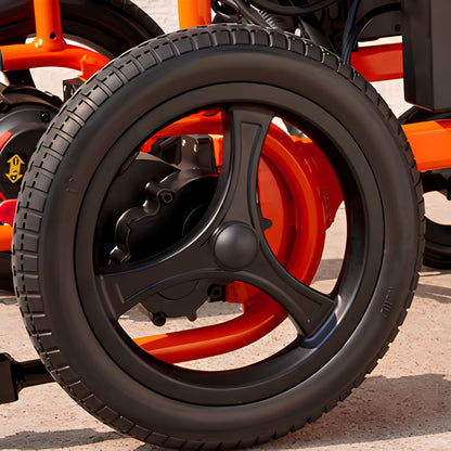 Close-up of the OAS Air Ultra 12-inch flat-free magnesium alloy rear wheel with anti-tip caster behind
