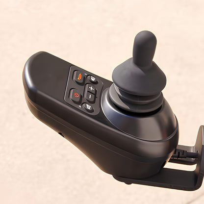 Close-up of the OAS Air Ultra 360-degree joystick controller with speed, horn, and light control buttons