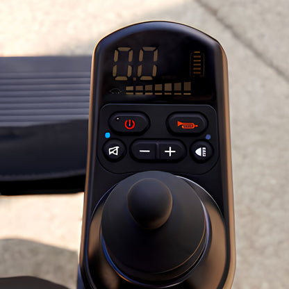 Close-up of the OAS Air Ultra LED display, battery gauge, power and speed buttons above the 360-degree joystick