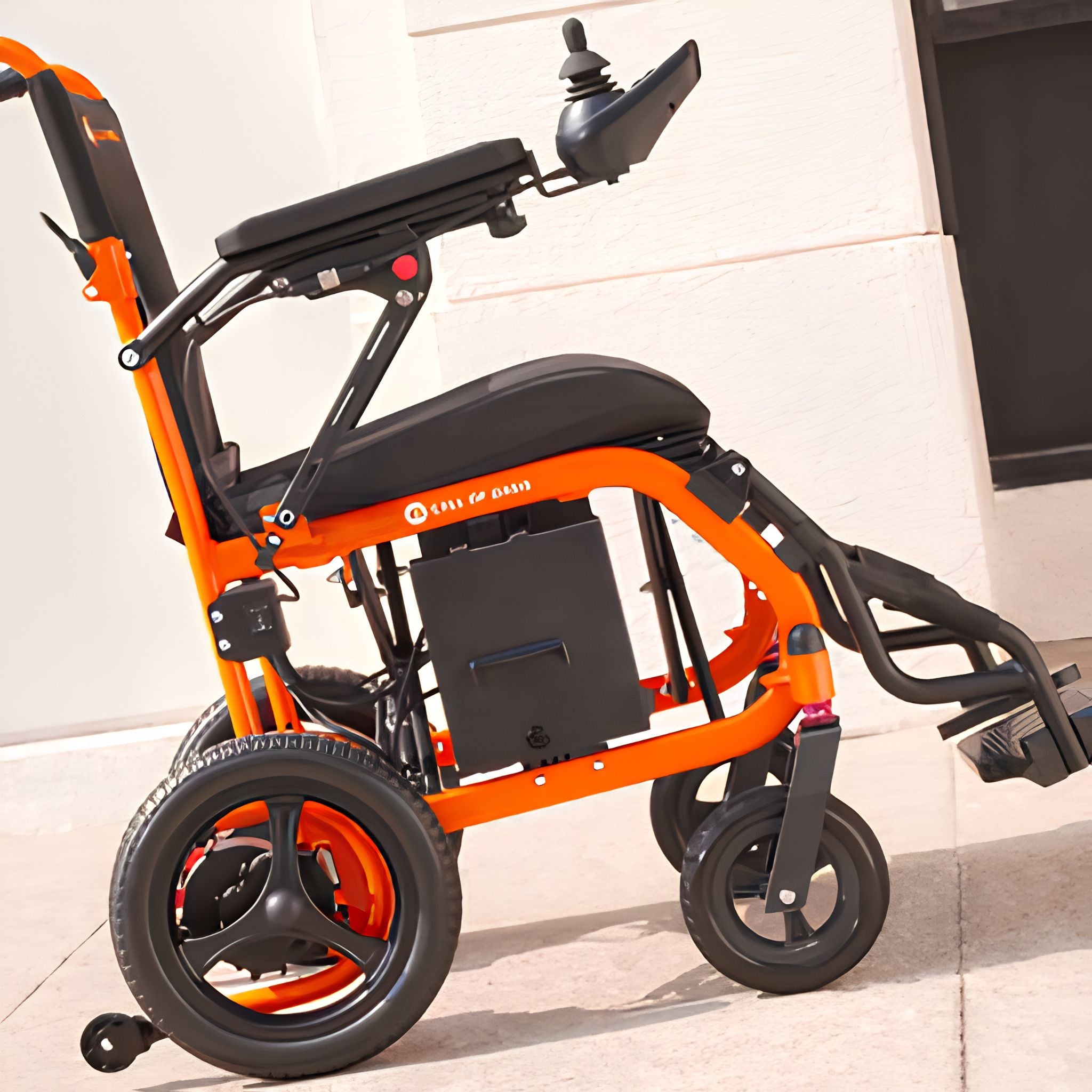 Close-up of the OAS Air Ultra rear tire traction and anti-tip casters that help it climb slopes up to 15 degrees