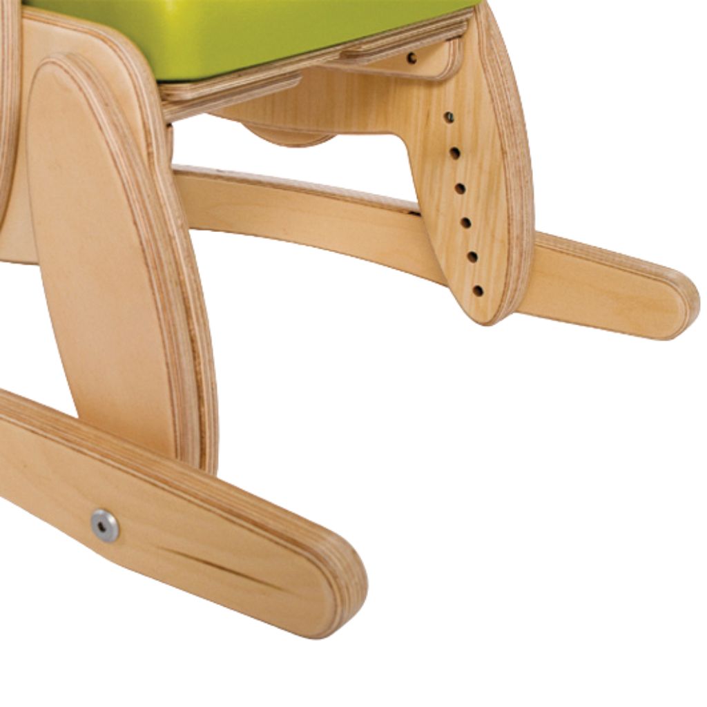 Natural wood skis fitted under a Smirthwaite Juni chair to stabilize it and prevent unwanted movement.
