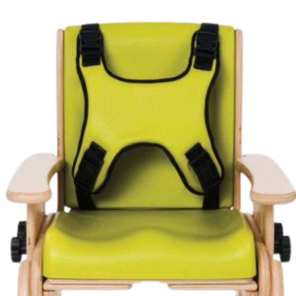 Green Smirthwaite Juni chair fitted with a black 4-point harness for trunk support and positioning.