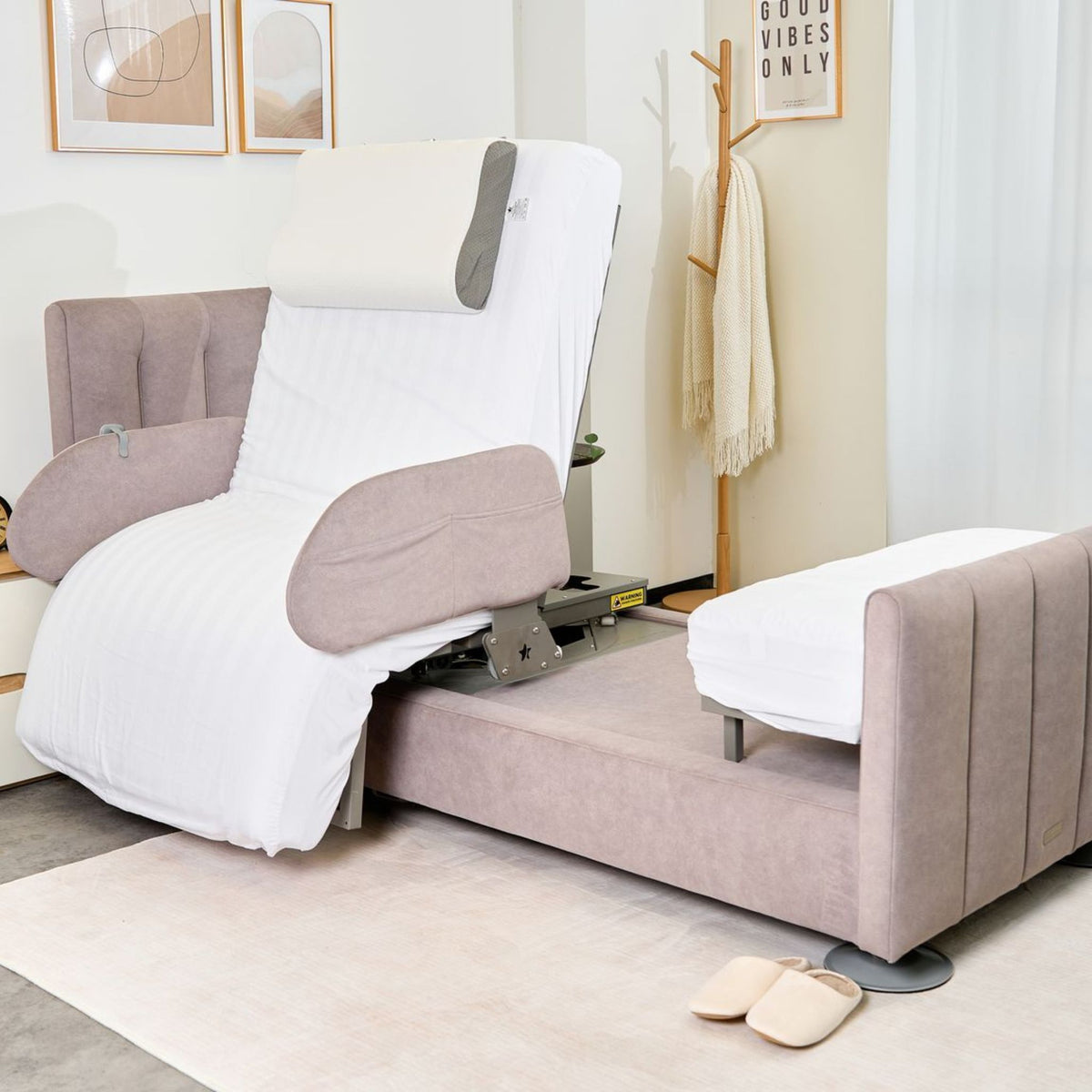 The Arlo rotating bed turned sideways into a chair position beside the bed base