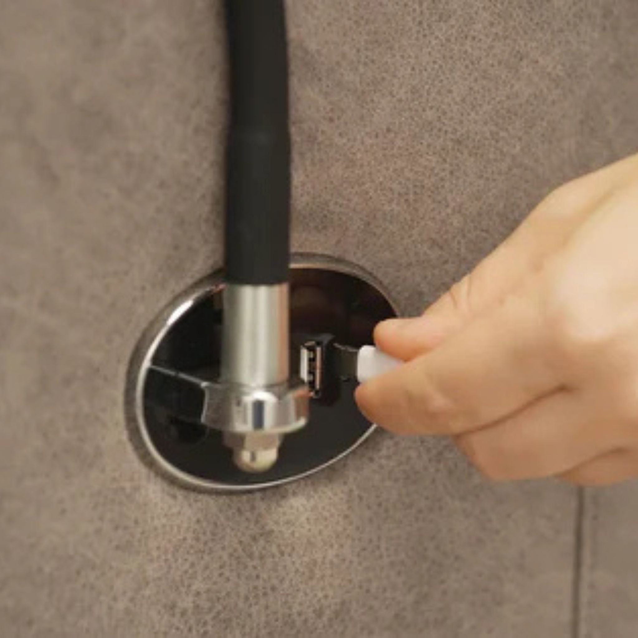 Close-up of Starise lift chair built-in USB charging port for convenient device charging while seated