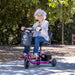 elder woman on on purple motorized scooter