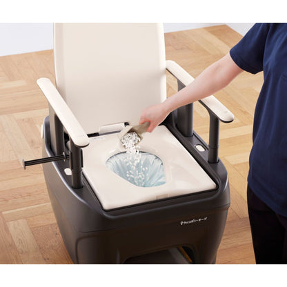 Adding absorbent coagulant to the Wrappon ORB portable commode toilet before automatic waste sealing