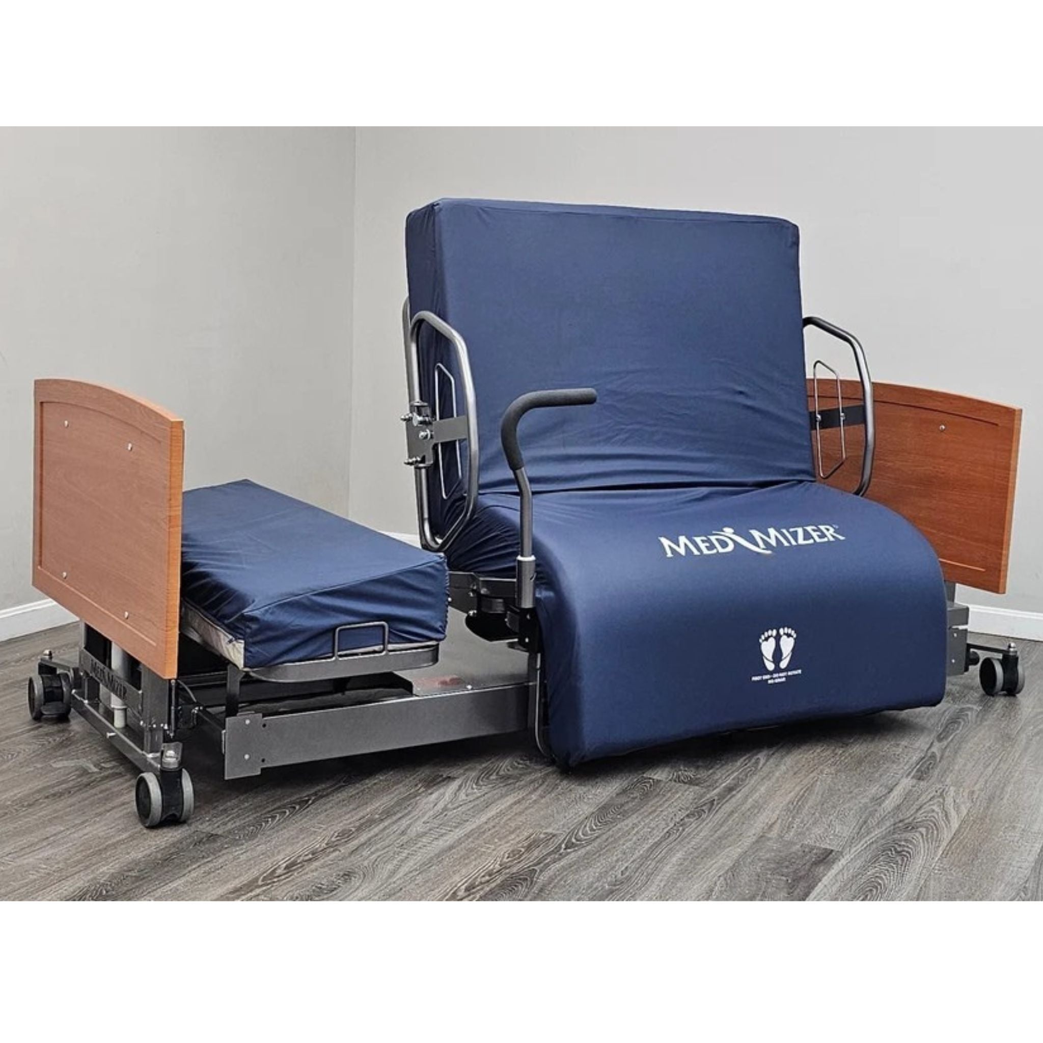 ActiveCare bed in chair position with right mobility bar for standing transfer assistance