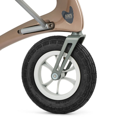 Close-up of the Carbon Overland pneumatic wheel and front fork designed for outdoor terrain.
