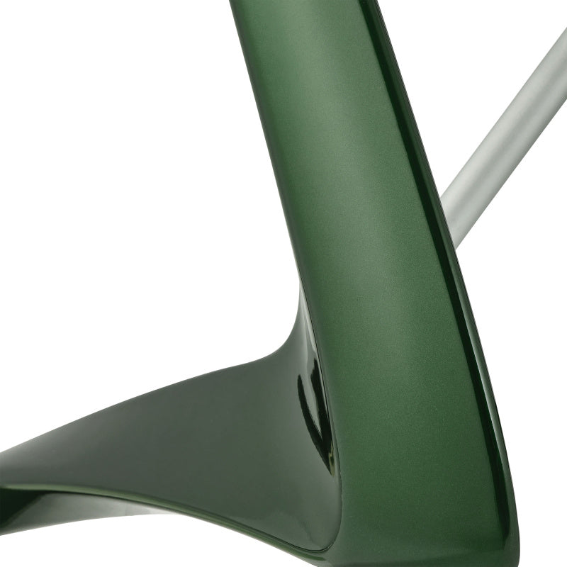 Close-up of the glossy carbon fiber frame and joint on a British Racing Green byACRE Carbon Ultralight rollator