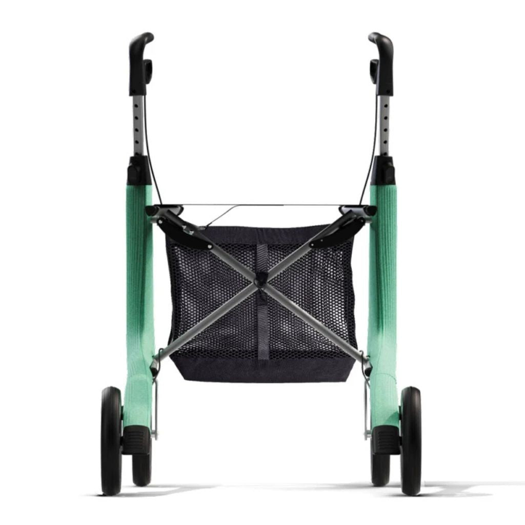 Rear view of a green byACRE Carbon Ultralight rollator showing the black mesh storage bag under the seat
