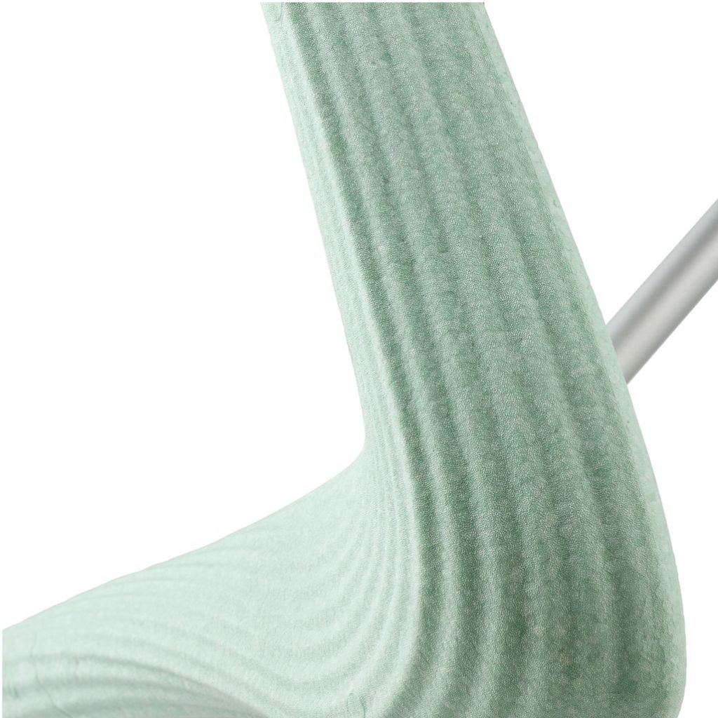 Macro close-up of the textured recycled aluminum frame on a byACRE Nordic Pioneer in Glacier Green