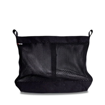 Black byACRE mesh storage bag accessory with fabric attachment loops and brand label, shown on its own