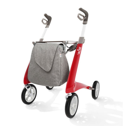 Gray melange byACRE Weekend Bag attached to a red byACRE rollator, shown from the front