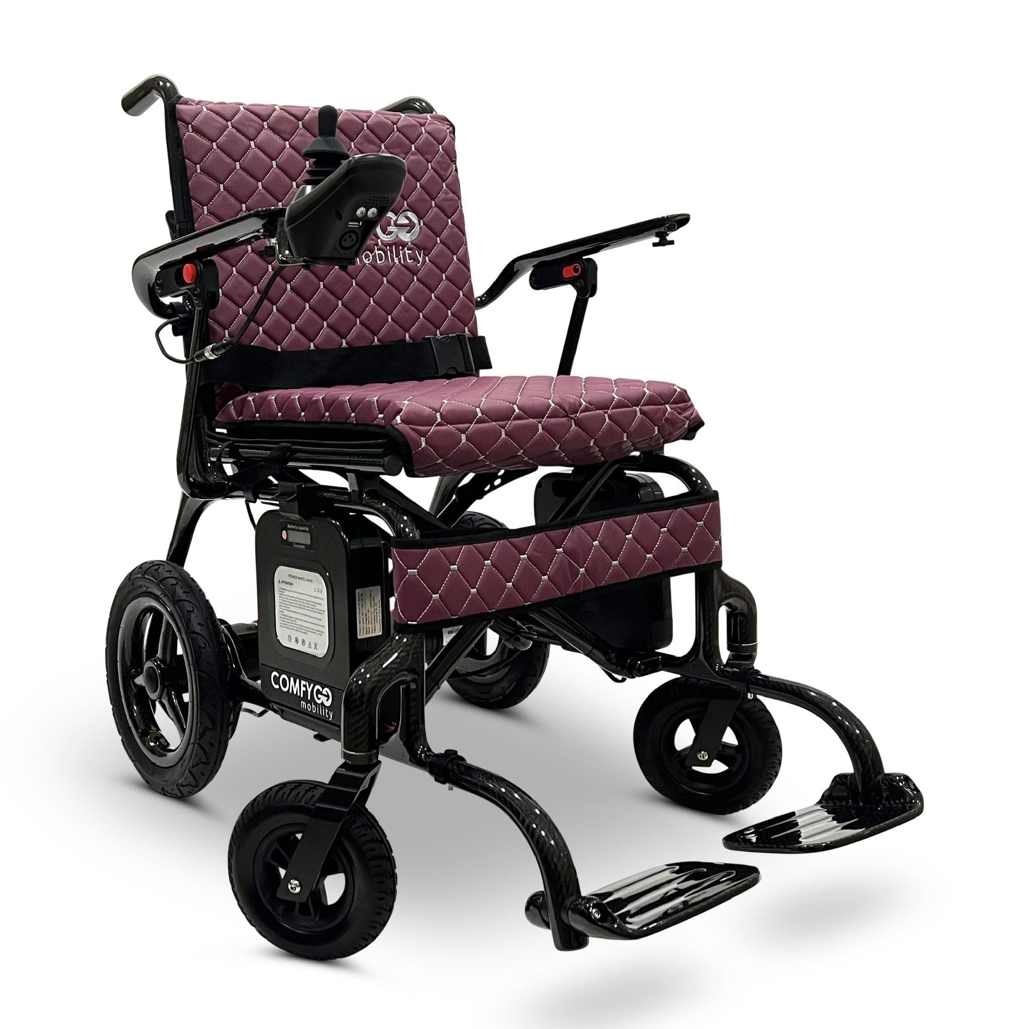 Front angled view of the purple ComfyGO Phoenix Carbon electric wheelchair featuring a lightweight carbon fiber frame, quilted seat cushions, joystick controller, foldable design, and compact travel-ready mobility system.