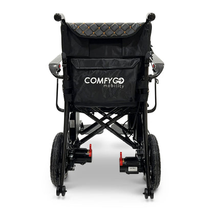 Rear view of the ComfyGO Phoenix Carbon electric wheelchair showing dual motors, storage pocket, foldable carbon fiber frame, and compact lightweight travel design.