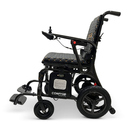 Side view of the ComfyGO Phoenix Carbon electric wheelchair featuring a lightweight carbon fiber frame, joystick controller, foldable footrests, lithium battery, and compact folding design.