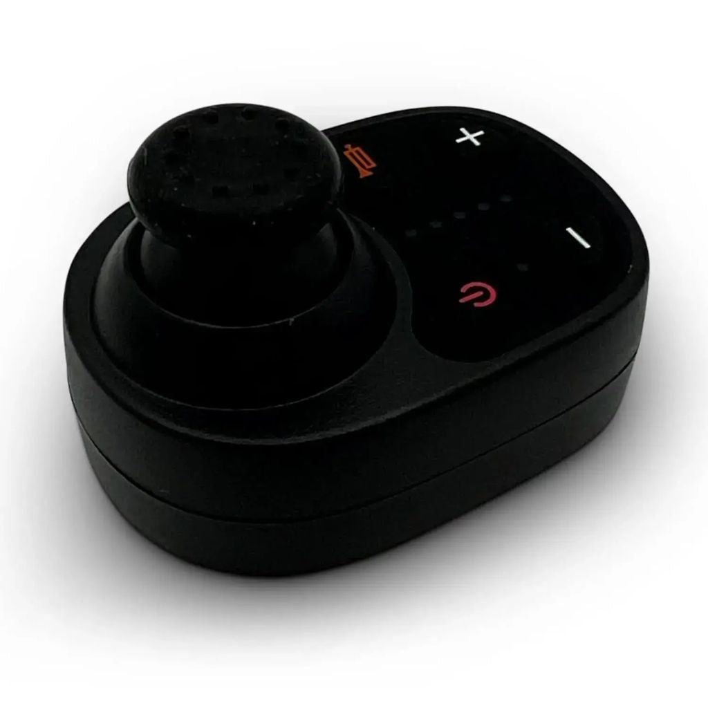 Side angle of the ComfyGo wireless caregiver remote showing the textured joystick and compact palm-sized design