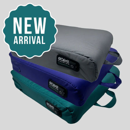 New arrival Ease Cushion covers in gray, blue, and teal, stacked to show all three colors with carry handles
