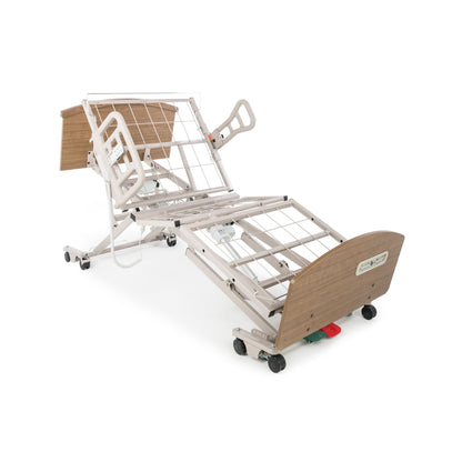 Graham-Field Zenith 7200 bed at full height with the head section raised and assist rail attached