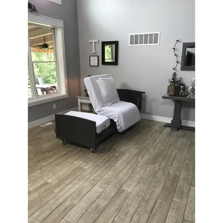 rotating bed with hi lo adjustment and caregiver support features