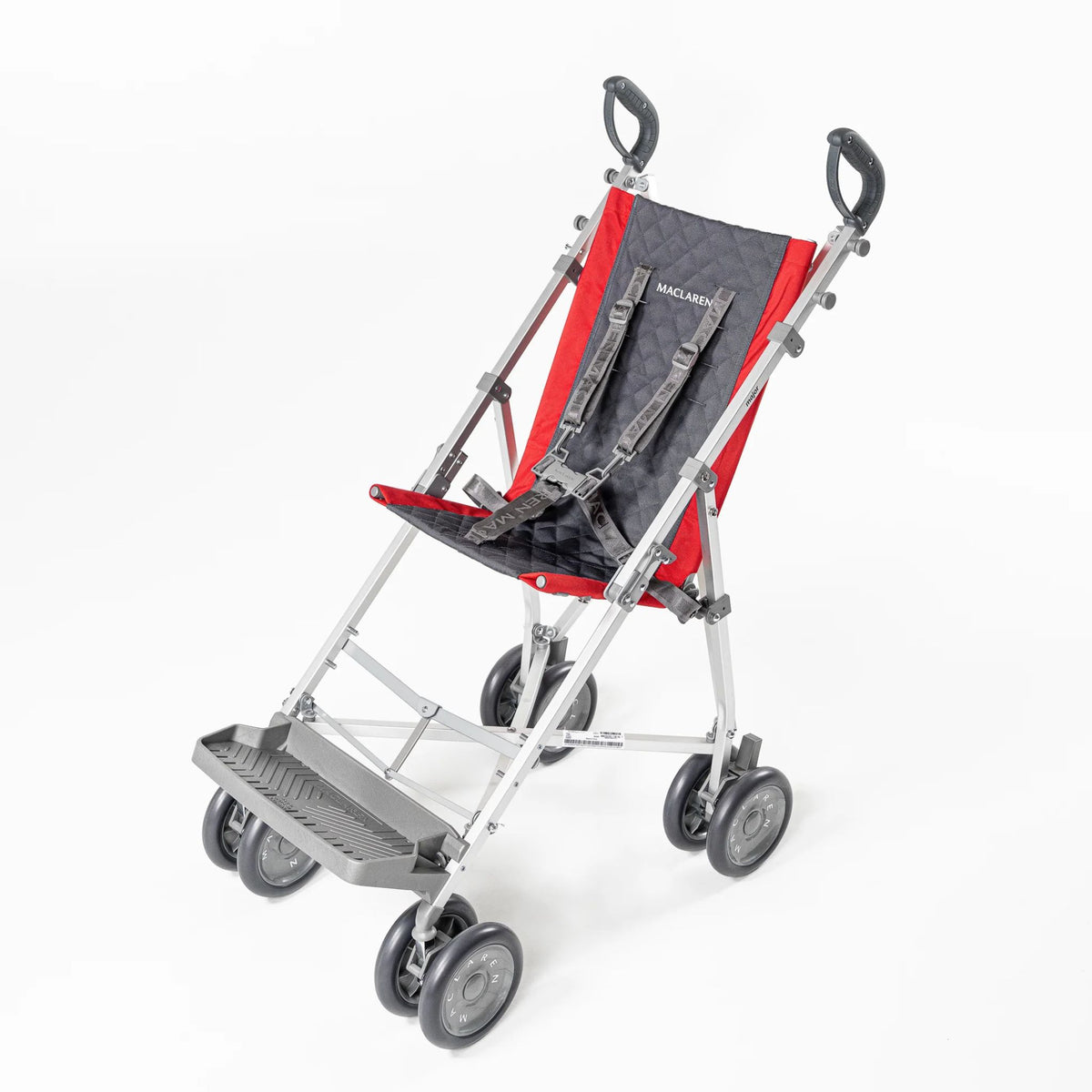 Maclaren Major Elite special needs stroller in Cardinal Red with grey quilted seat, five-point harness, and footrest, three-quarter view