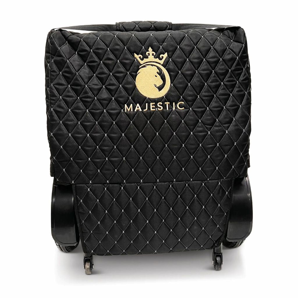 Majestic quilted travel bag covering a folded power wheelchair, with the wheels and casters exposed at the base