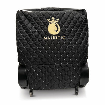 Majestic quilted travel bag covering a folded power wheelchair, with the wheels and casters exposed at the base