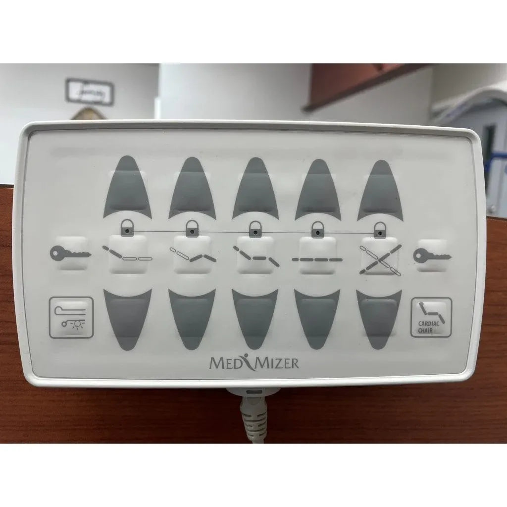 floor level hospital bed with adjustable width and caregiver friendly controls