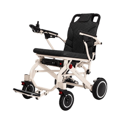 OAS Air Pro 2027 lightweight folding electric wheelchair in Latte, front angle view with quilted seat and joystick controller