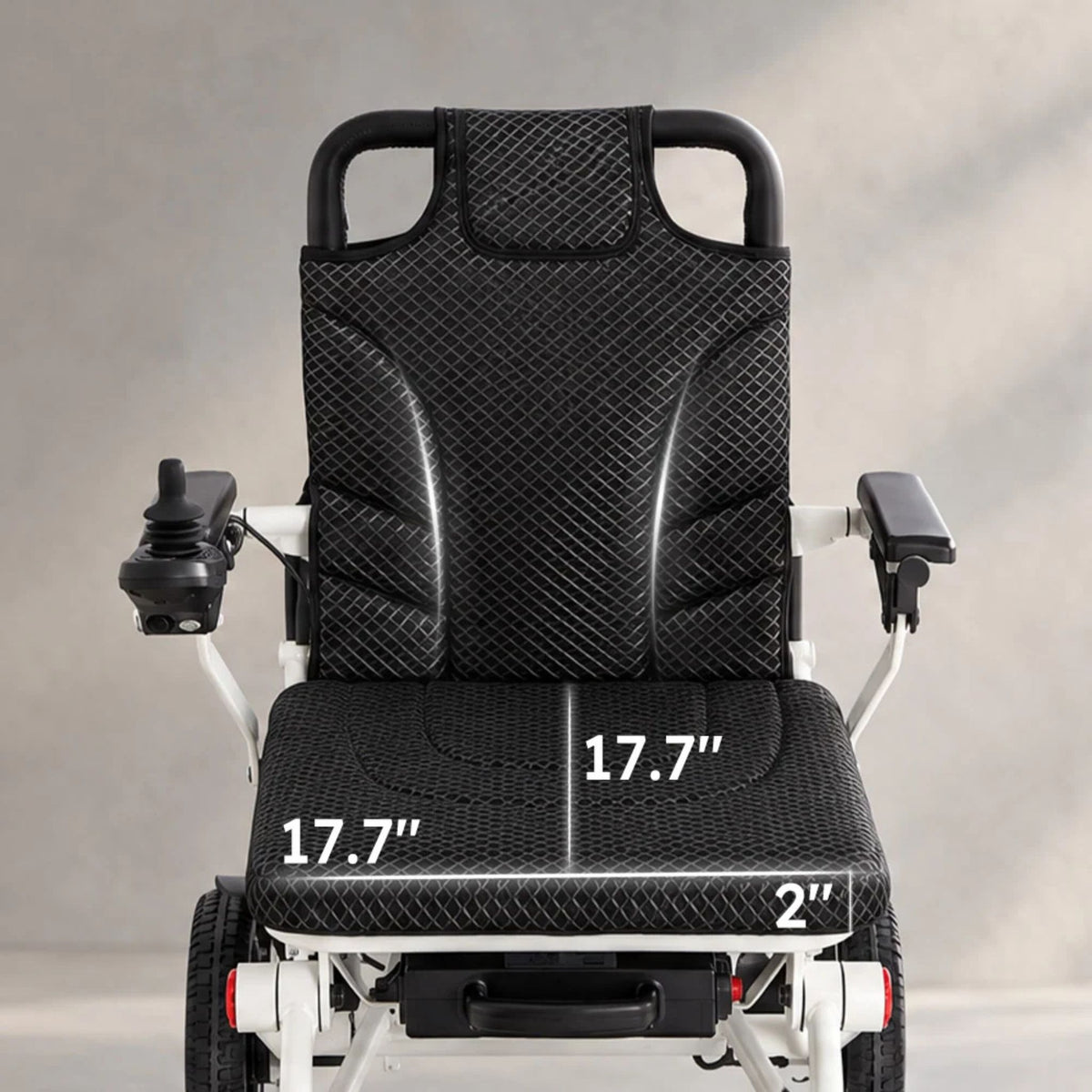 OAS Air Pro 2027 electric wheelchair seat measuring 17.7 by 17.7 inches with 2-inch cushion, front view showing joystick and armrests
