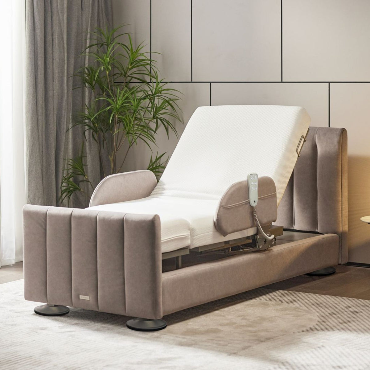 The Arlo adjustable rotating bed with its backrest raised, shown empty in a bedroom
